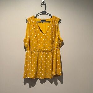 Polka-dot peplum blouse